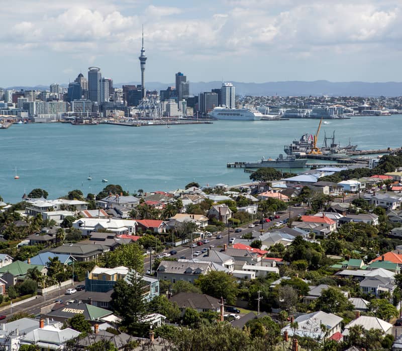 Auckland cityscape with Sky Tower and Waitematā Harbour. Credit: G Adventures