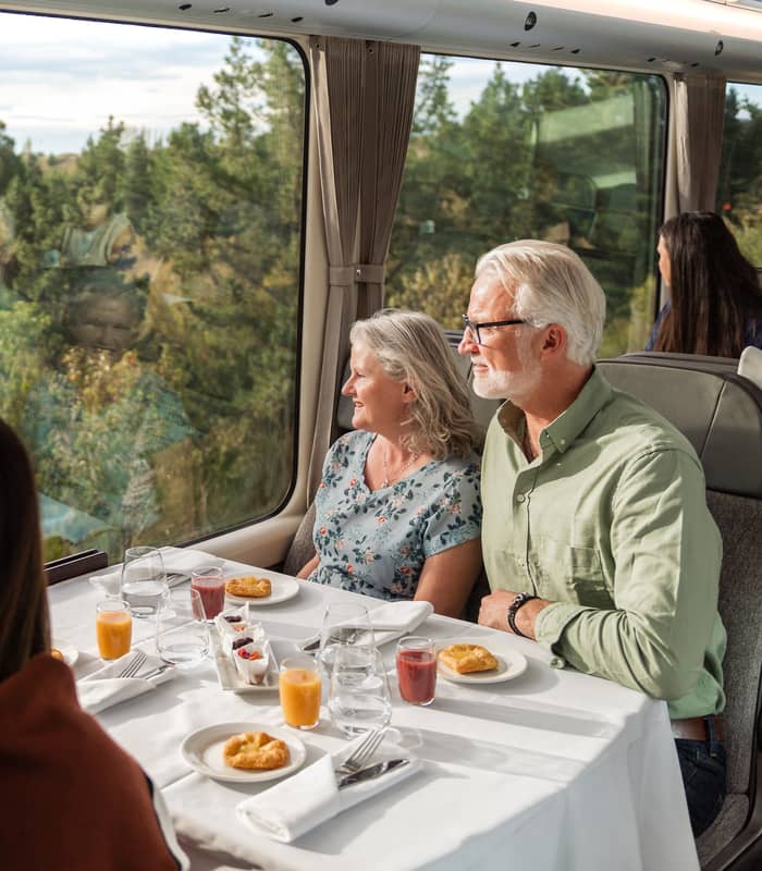 552103-customers-on-board-enjoying-breakfast-service.jpg
