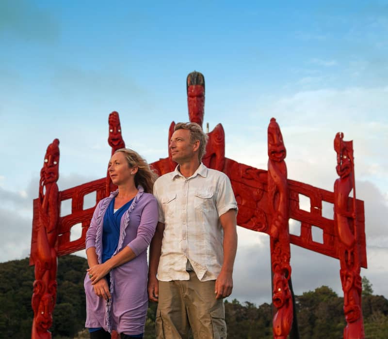 Couple standing at Waitangi Treaty Grounds Marae.