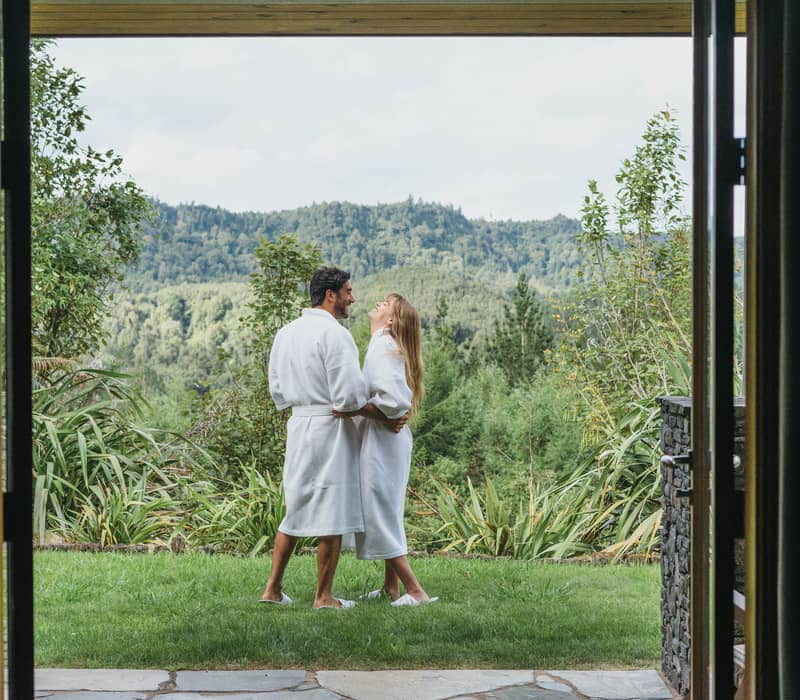 Couple relaxing at Treetops Lodge Credit: Treetops Lodge