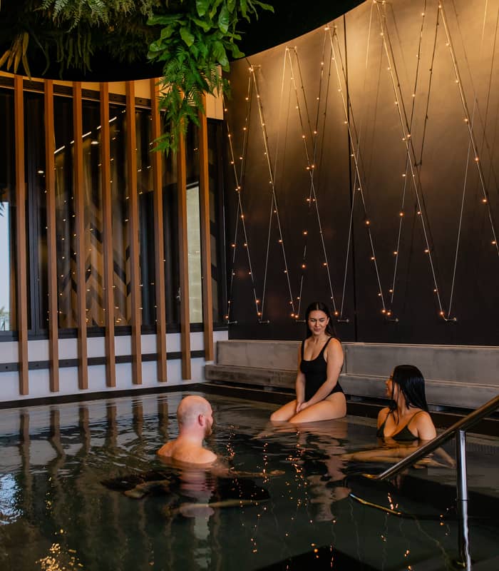People relaxing in pool talking at Wai Ariki Credit: Wai Ariki